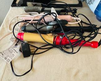 Curling irons, straighteners