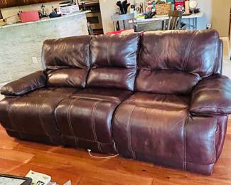Leather electric reclining couch in excellent condition