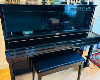 Yamaha Disklavier. A world class Yamaha piano, but the additional features, such as playing itself, do not work. BEAUTIFUL sound!