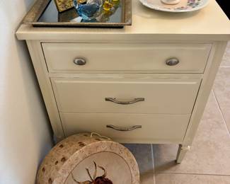 Smiling nightstand.  Now you see it too.