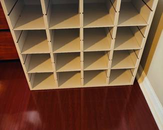 Shoe storage.  Built for ladies only.  We all know why.