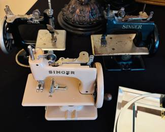 Tiny little machines for making tiny little clothing.