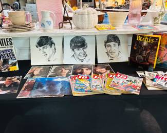 Here's a shrine to the boys from Liverpool.  George didn't make it to the artist.