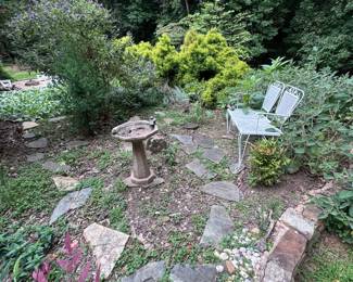 Bird bath and metal outdoor seating