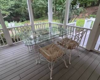 Glass and metal patio set