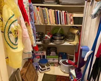 Aprons, kitchen cookbooks, pans