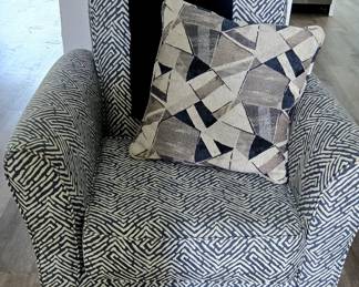 Blue swivel living room chair = $150, originally $499