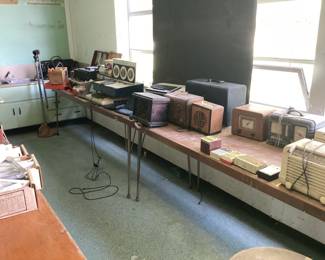 Radios and early computer tech in this photo. There is a Timex Sinclair computer with the printer and storage device.