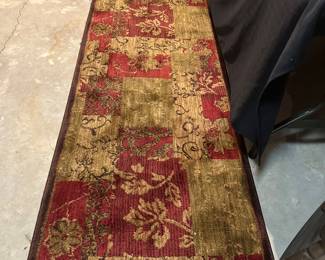 Several large area rugs