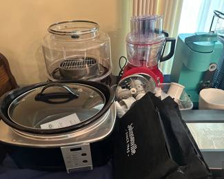 Among several small kitchen appliances: Crock Pot Designer Series, Nu Wave Dehydrator, Kitchen Aid Food Process, Keurig Coffee Maker, and more