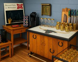 Raise a glass, because this collection is the toast of any home bar! Weâve got vintage Miller High Life signage declaring âThe Champagne of Bottle Beerâ (because Milwaukee said so), a Cutty Sark clock that makes happy hour punctual, and glassware so gold-trimmed it practically demands a tuxedo. Add in bar carts both modern and retroâready to roll with your finest spiritsâand a mosaic bull bar that stares down weak cocktails with glowing red eyes. Need tools of the trade? A sharp set of chefâs knives is standing by to slice citrus or intimidate your in-laws. Whether youâre a whiskey neat purist, a cocktail shaker enthusiast, or just here for the ice bucket challenge, this bar setup has everything you need to turn âlast callâ into âcall again tomorrow.â