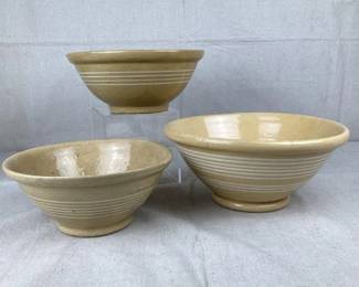 Three Yellow Ware Bowls