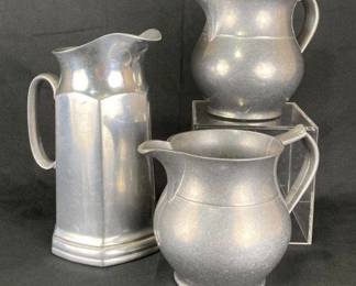 Three Pewter Pitchers