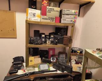 Antique cameras and toy gun