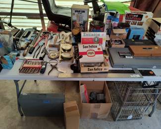 Tools including several taps and a tap and die set