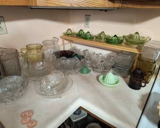 Glass bowl sets, pitchers, juicers ( some are Fire King) and refrigerator containers