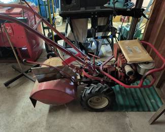 Troybuilt garden tiller with manual. Tiller does work.