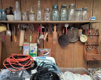 Antique jars, antique utensils, spoon holder, vacuum with manual, Roomba, linens