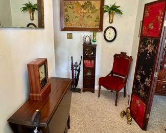 Foyer. Antique crewel scene
