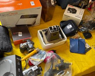 Vintage Kodak instant camera and others.
