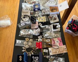Plenty of costume jewelry. Rings, earrings, necklaces and bracelets.