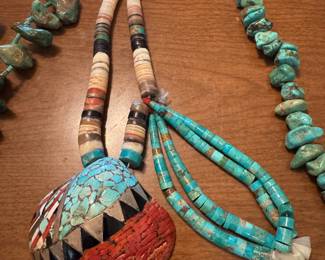 Inlaid shell necklace with double drop.