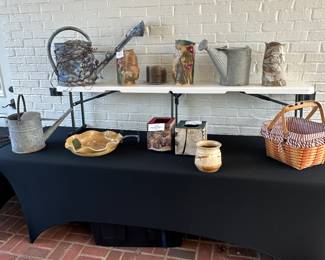 3
Very old watering cans and pottery by local artists