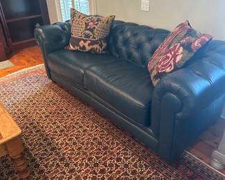 There are four of these woven rug pillows