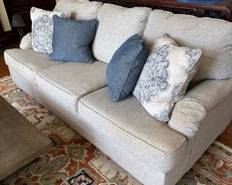 Beautiful fabric couch with pillows