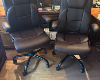 2 like new matching office chairs