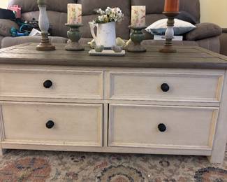 7 pieces of Ashley Signature line furniture. coffee table