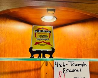 Triumph Sign