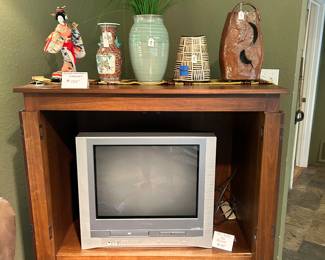 Entertainment Center with fold back doors
Toshiba TV that plays VCR Tapes and DVD’s