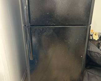 Black refrigerator would be perfect for utility room or garage