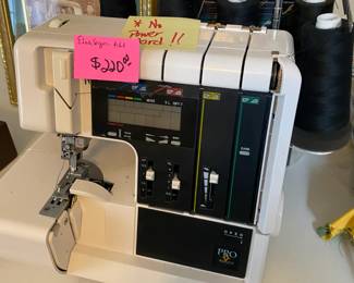 Elna Serger $ 220.00 - works but needs power cord.