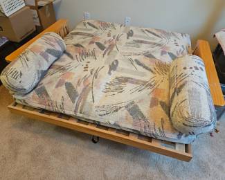 As I promised here is the futon opened up, I don't think it's big enough for an adult but for a child it is perfect for watching a Disney movie