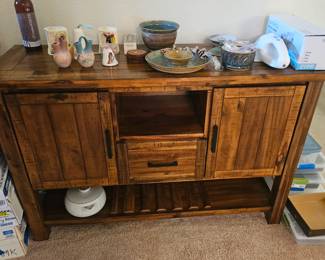 By the entrance of the front door is this beautiful piece. Very rustic, very Northern