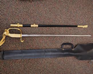 Vintage US Navy officer sword with sheath and extras.
