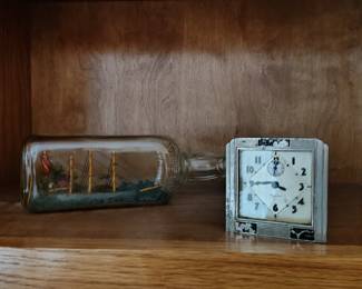 Art deco westclox antique alarm clock. And ship in a bottle.