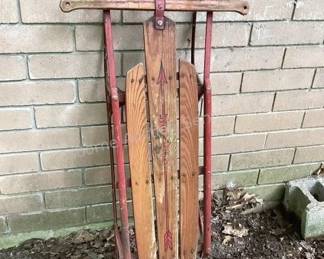 Several vintage snow sleds to choose from