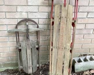 Several vintage snow sleds to choose from