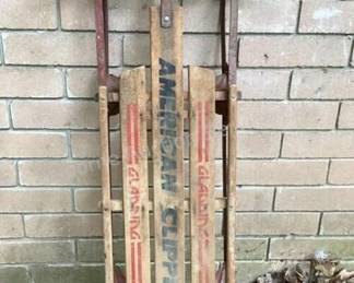 Several vintage snow sleds to choose from