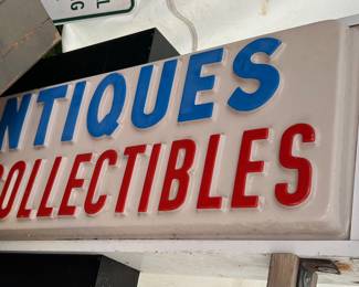 Antique and collectibles sign lights up