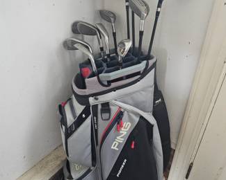 One of several sets of golf clubs.