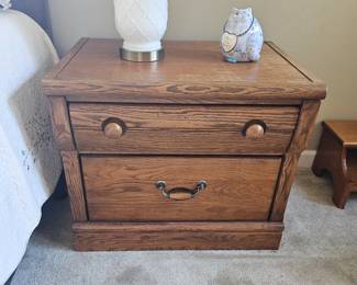 Oak nightstand matches oak bedroom set