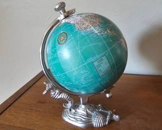 World globe with beach motif base