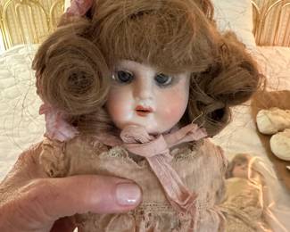 Front of Bisque Doll, glass eyes - needs some re-do