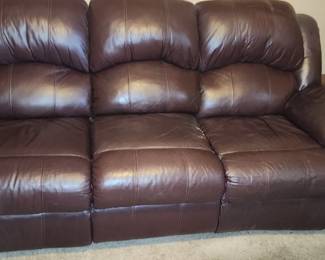 Leather couch with 2 recliners on each end