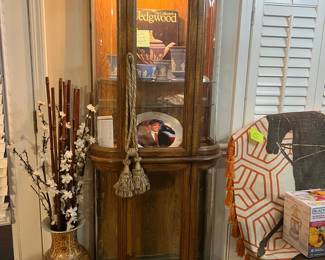 Gorgeous vintage curio cabinet with lights on top and bottom