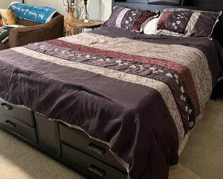 Queen size bed with drawers at foot and sides (part of bedroom set)